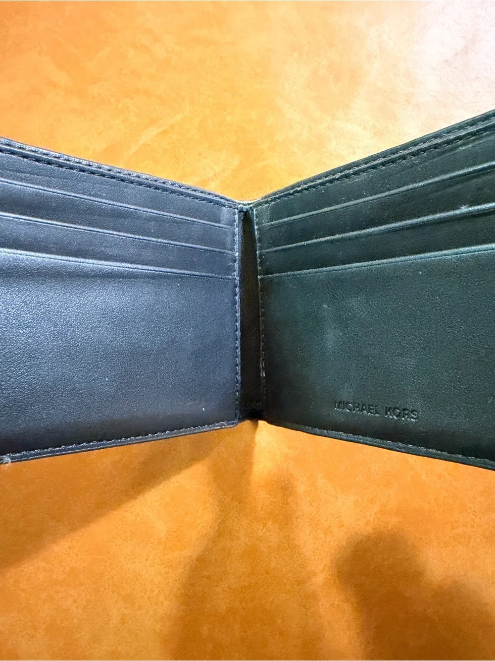 Michael Kors Black Leather Men's Bi-Fold Wallet with Silver Logo